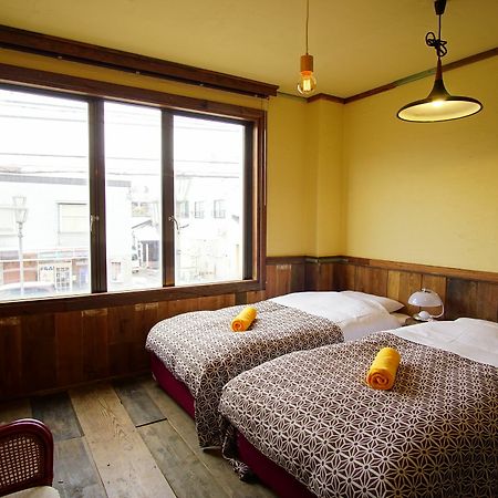 Hakuba Station Guesthouse En Exterior foto