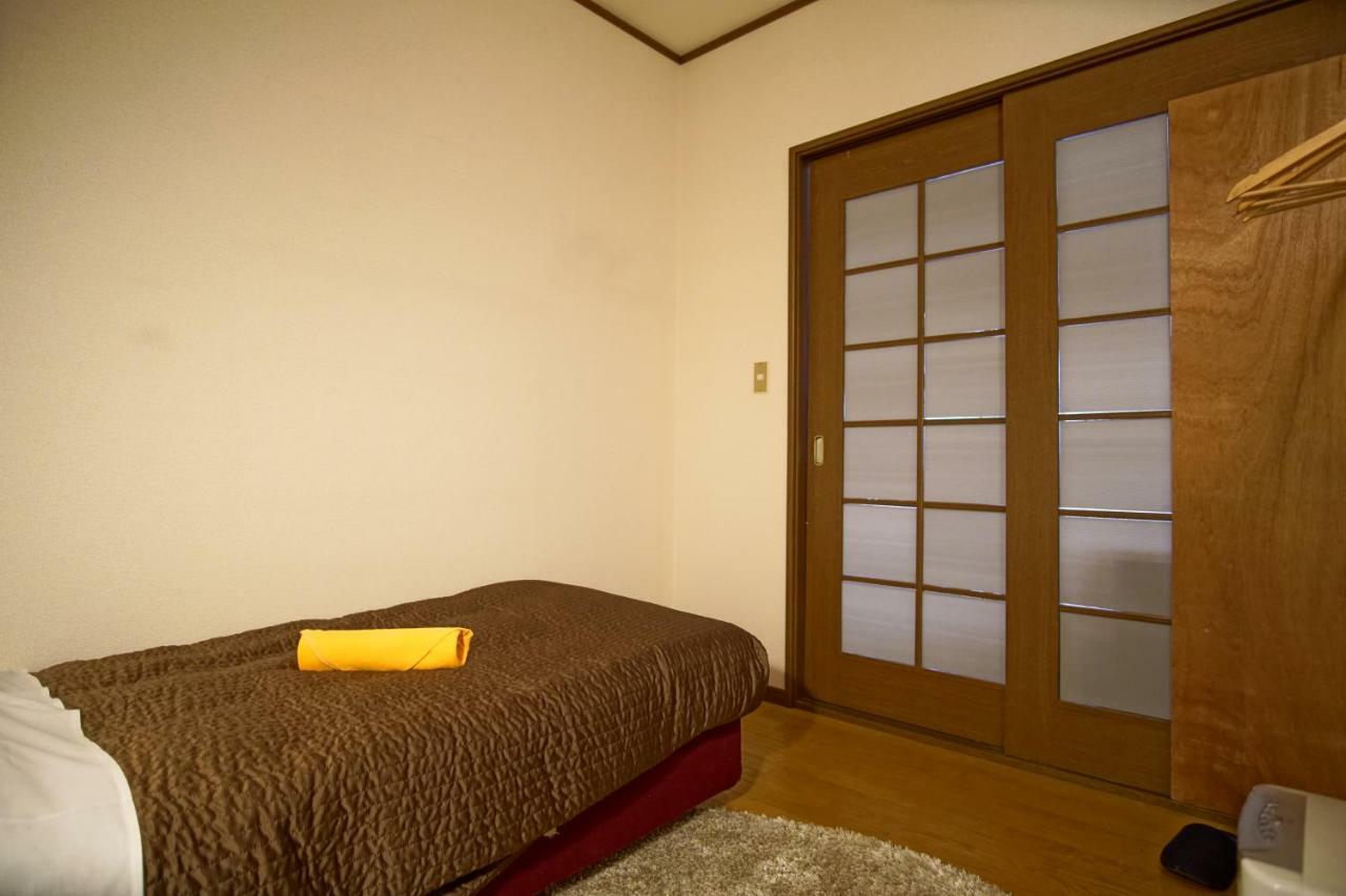 Hakuba Station Guesthouse En Exterior foto